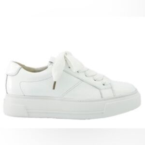White patent leather Sneakers. 
Never Worn, in Box.